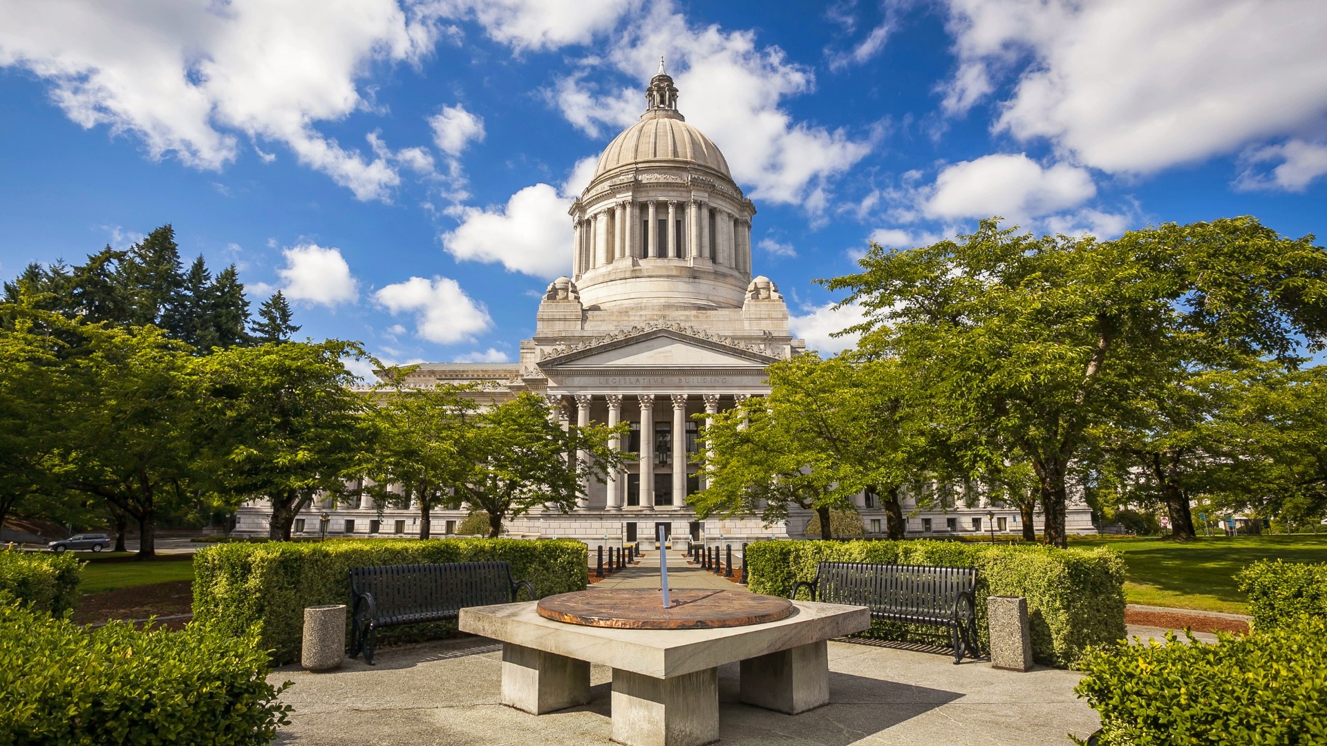 Facing a $10-$12 billion budget shortfall, Gov. Jay Inslee has enacted a spending freeze on non-essential service contracts and unfilled government jobs statewide